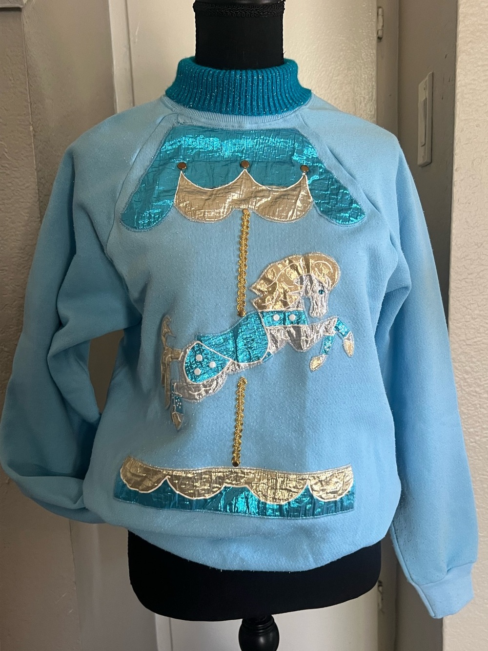 Light Blue Crewneck Sweater with Metallic Carousel Appliqué
